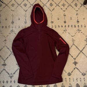 Arc'teryx Women's Burgundy fleece with orange accents